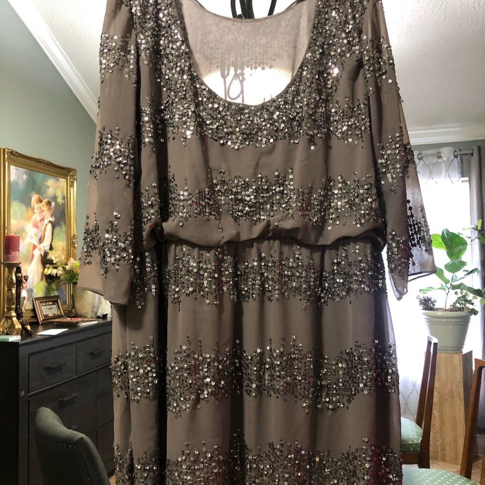 Beaded dress by Adrianna Pappell